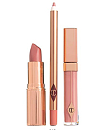 Pillow Talk Full Size Lip Kit - Lip Liner, Lipstick, and Lip Gloss by Charlotte Tilbury. A universally flattering nude-pink lip kit for creating a variety of looks, from natural to glamorous.