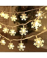 CESOF Christmas Decorations Lights, 20 Ft 40 LED Snowflake String Lights Battery Operated Fairy Lights for Bedroom Room Party Home Office Xmas Decor Indoor Outdoor Tree Decorations Warm White