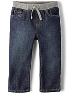 A boy baby or toddler wearing pull-on straight jeans