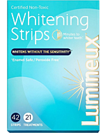 Applying Lumineux Teeth Whitening Strips for a whiter smile. - Anti allergy Teeth Whitening Strips