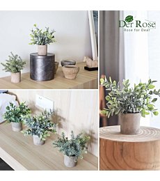 Three mini potted artificial eucalyptus plants in a stylish ceramic pot.