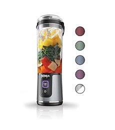 Ninja Blast Portable Blender on a counter with fresh fruit.

