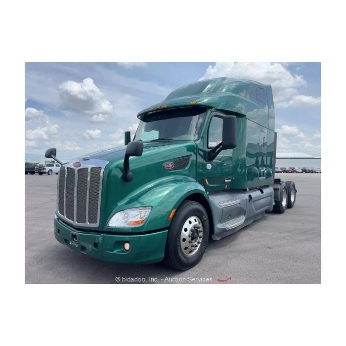 Sleek 2019 Peterbilt 579 sleeper cab semi truck tractor with diesel engine.