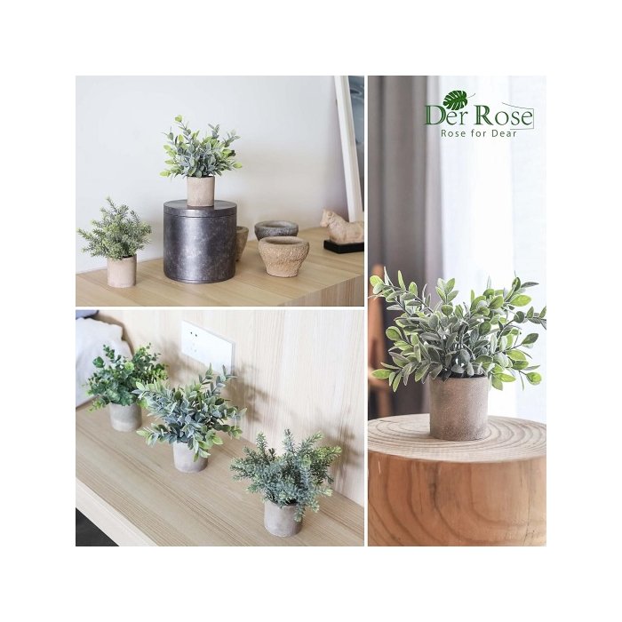 Three mini potted artificial eucalyptus plants in a stylish ceramic pot.