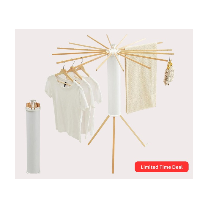 Foldable Tripod Clothes Drying Rack with clothes hanging on it indoors.