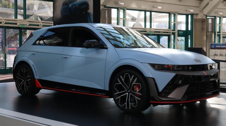 Blue Hyundai Ioniq 5 electric car on display at a car show